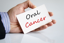 Oral cancer written on a white card
