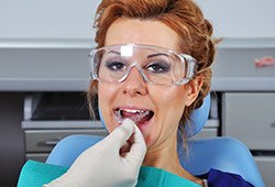 Woman having oral appliance fitted