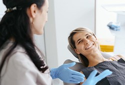 Dentist discussing the cost of a dental crown in Stephens City
