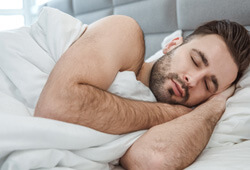 man sleeping on his side