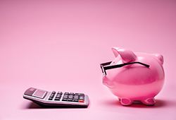 Calculator and piggy bank