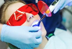 Woman getting a dental filling 