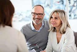 two patients at a consultation with their dentist