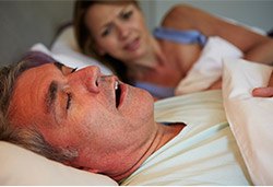 woman relaxing and lying back in the dentist chair