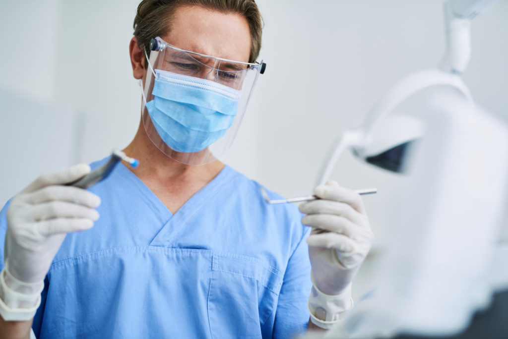 Dentist in Stephens City wears protective equipment.