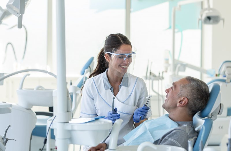 Dentist in Stephens City talking to patient