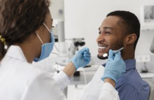 man visiting his dentist in Stephens City to reduce his risk of oral cancer 