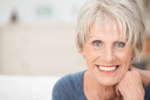 Older woman with attractive teeth smiling