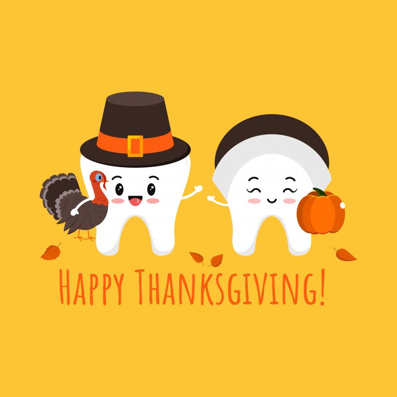 Cartoon teeth dressed in thanksgiving garb