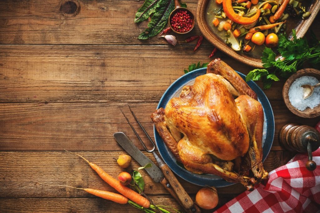 Table with turkey and side dishes