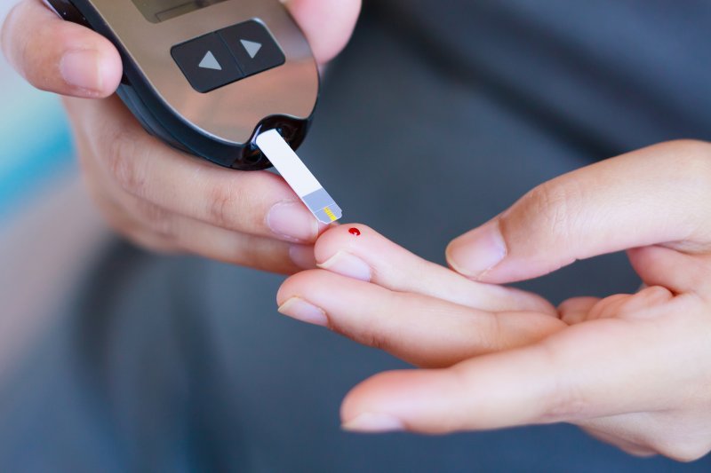 Person checking their blood sugar